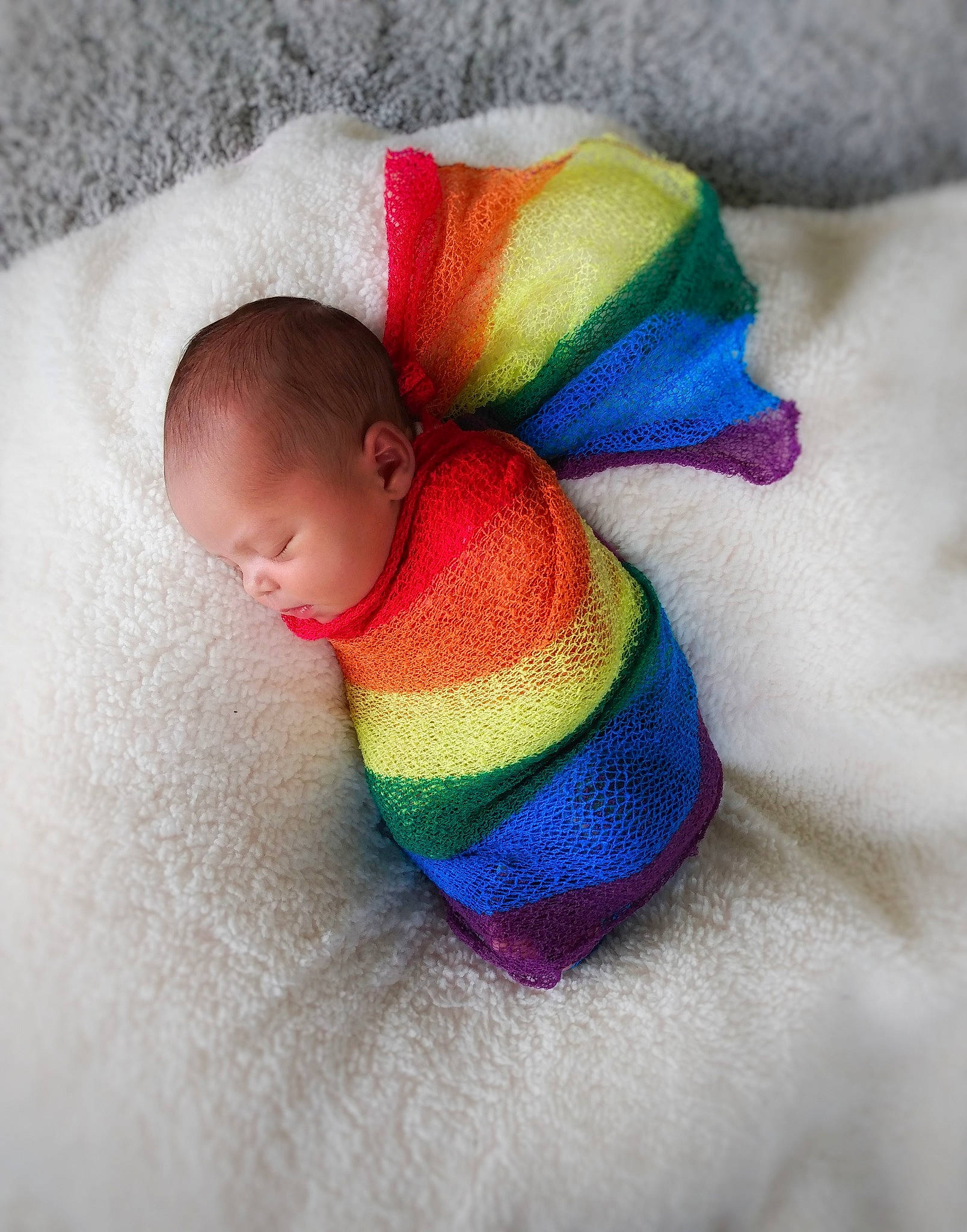 Zola is registered to the contest to win money with this photo: baby, blue, child, hand, linens, nap, person, play, product, skin, sleep, textile, toddler, wool