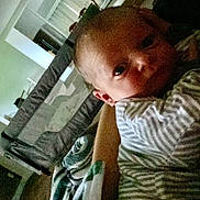 Colter is registered to the contest to win money with this photo: architecture, baby, bed, bedroom, building, chair, clothing, couch, cushion, face, furniture, head, homedecor, indoors, livingroom, person, photography, portrait, room, sitting