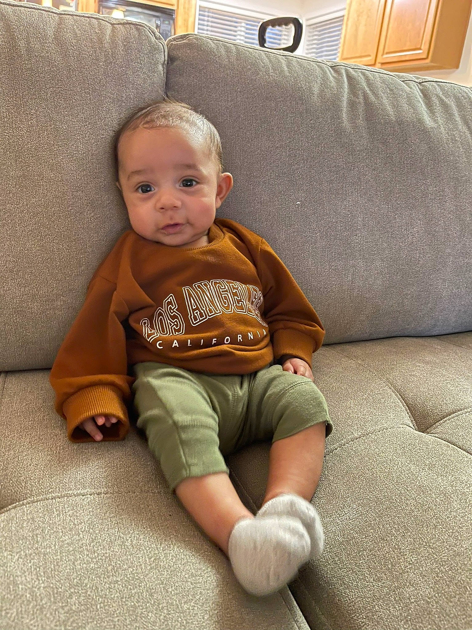 Royal joined the competition — help win amazing prizes! baby, baby_toddler_clothing, chair, cheek, child, comfort, couch, finger, floor, flooring, human_leg, knee, lap, person, room, sitting, skin, sleeve, t_shirt, toddler