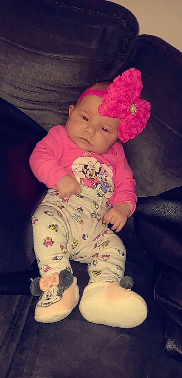 Miia participe au concours pour gagner de l'argent avec cette photo : baby, baby_toddler_clothing, cap, cheek, comfort, cool, eye, face, happy, headwear, human_body, iris, lip, nose, organ, person, pink, purple, skin, sleeve