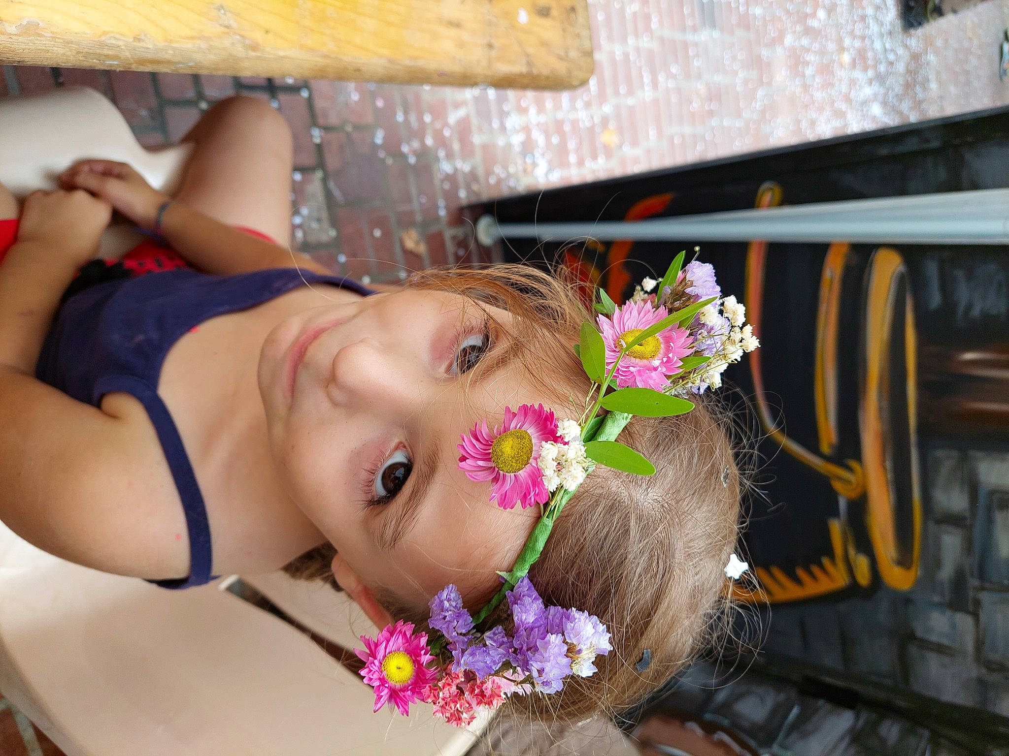 Katania participe au concours pour gagner de l'argent avec cette photo : black_hair, child, event, eyelash, facial_expression, fashion_accessory, flower, flower_arranging, fun, hair, happy, headwear, joy, leisure, lip, person, petal, pink, plant, skin