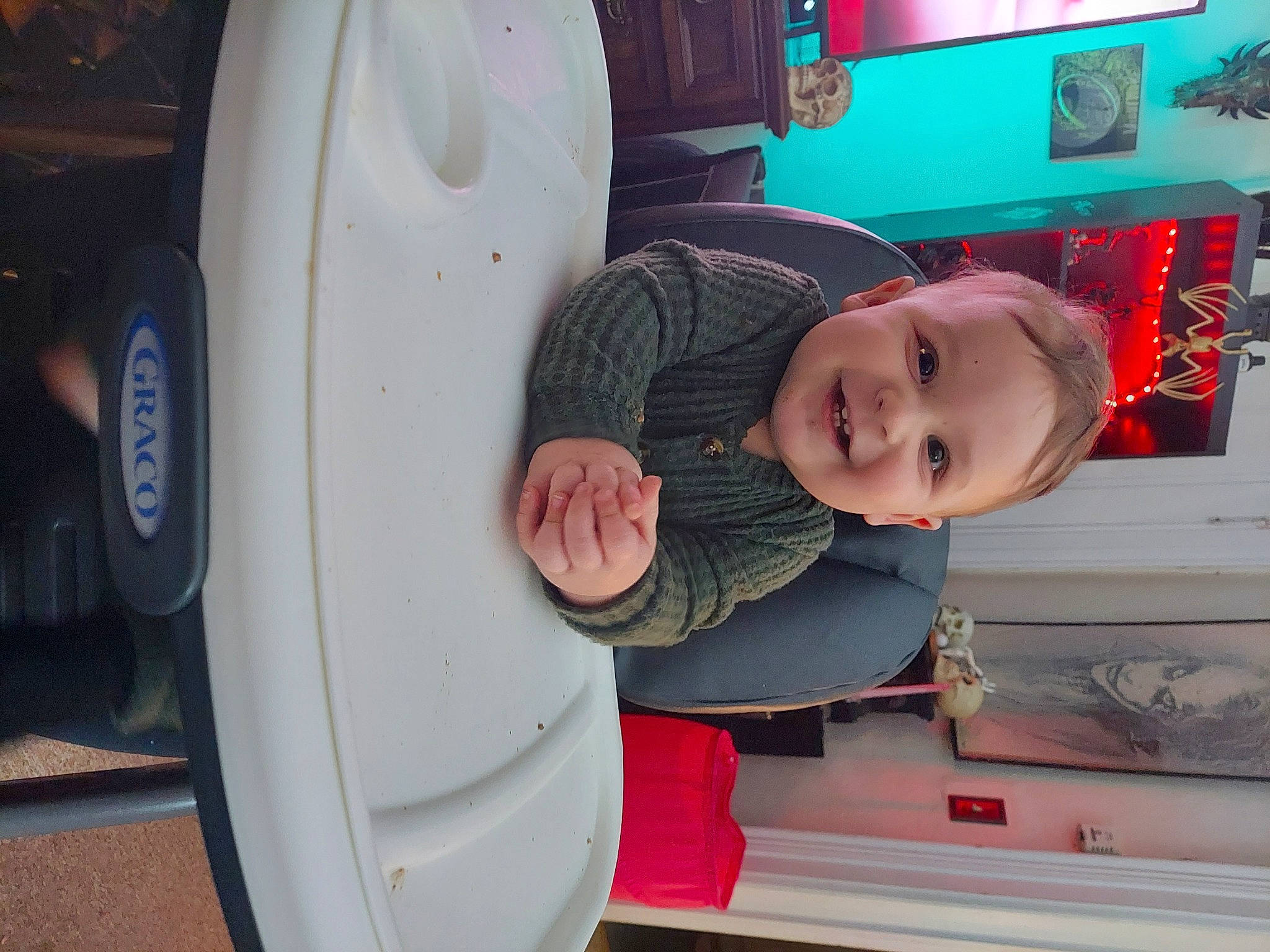 Dean is registered to the contest to win money with this photo: auto_part, automotive_design, automotive_exterior, automotive_lighting, automotive_tire, baby, baby_toddler_clothing, bumper, child, fender, fun, hat, hood, joy, motor_vehicle, person, smile, t_shirt, tire, toddler