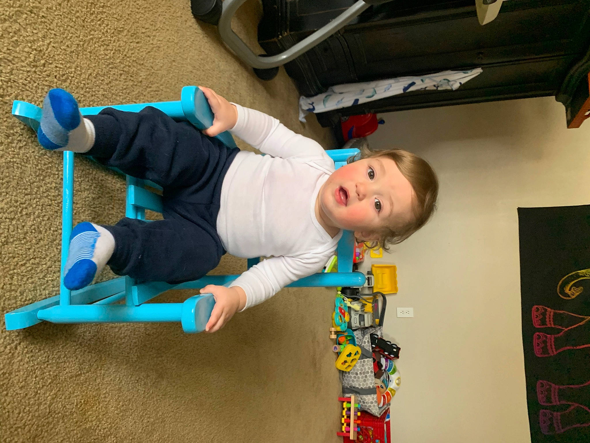 Elián is registered to the contest to win money with this photo: automotive_tire, child, denim, electric_blue, fun, jeans, knee, leisure, person, recreation, room, skateboard, skateboarding_equipment, sneakers, sports_equipment, tire, toddler, toy, vehicle, walking_shoe