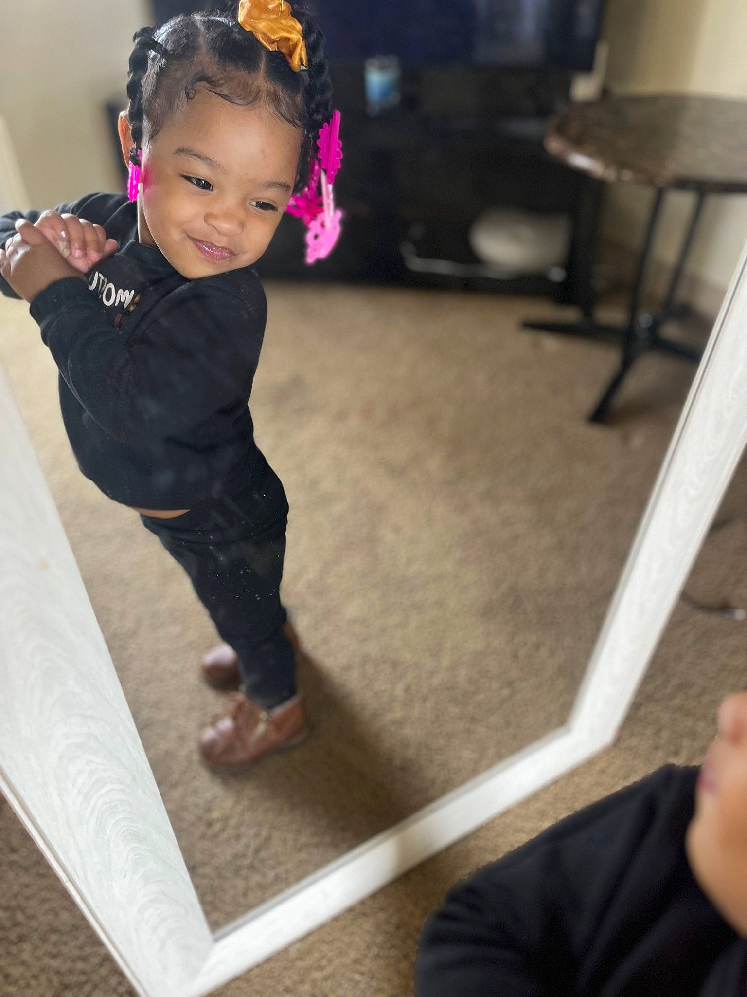 Sarai is registered to the contest to win money with this photo: baby, baby_toddler_clothing, black, child, flooring, fun, happy, hardwood, jewellery, joy, leisure, person, sitting, sleeve, smile, snapshot, sportswear, standing, t_shirt, toddler