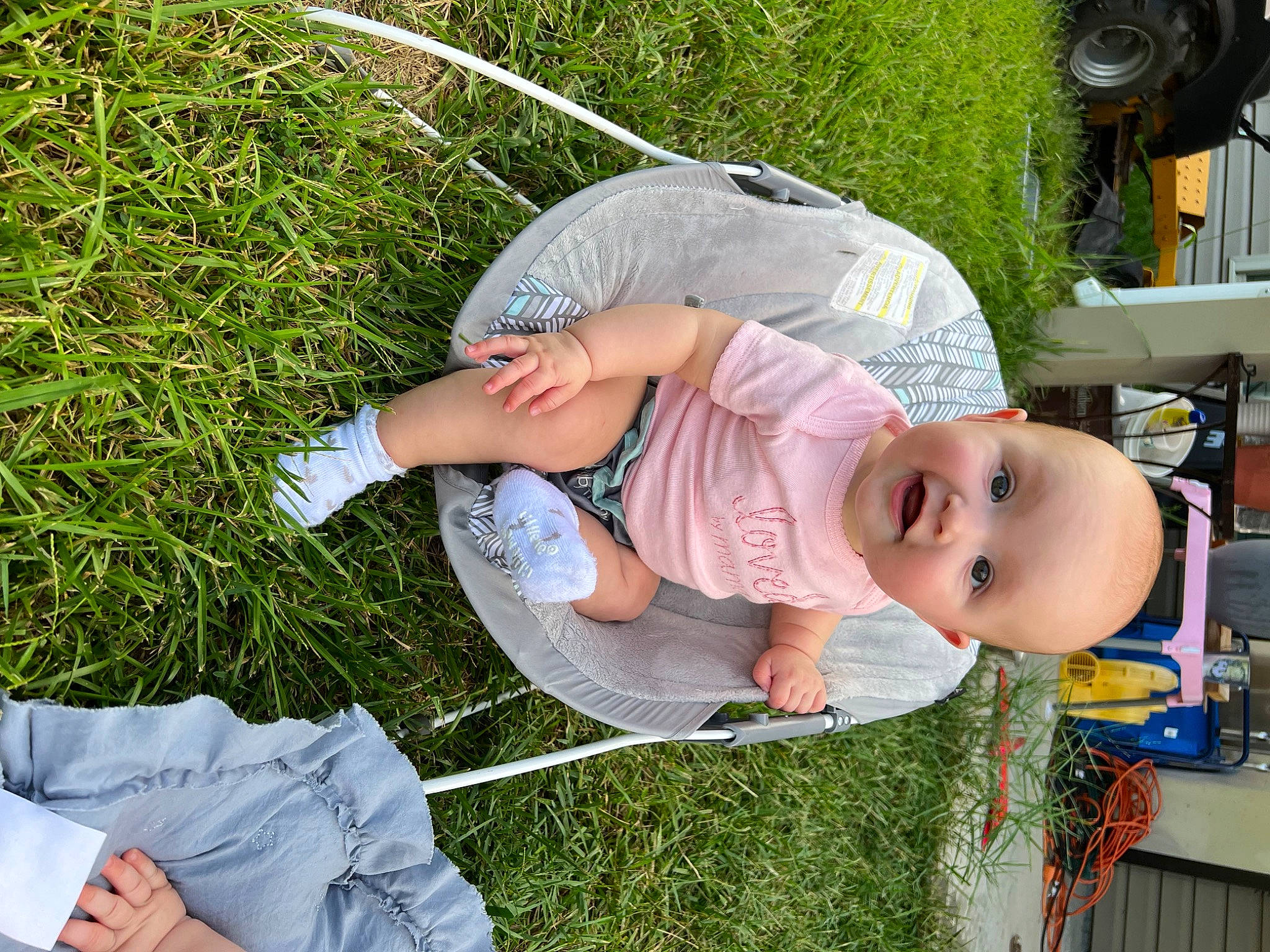 Luna joined the competition — help win amazing prizes! automotive_tire, baby, baby_toddler_clothing, child, fun, grass, green, hat, lawn, leisure, people_in_nature, person, plant, recreation, shoe, smile, sneakers, summer, tire, toddler