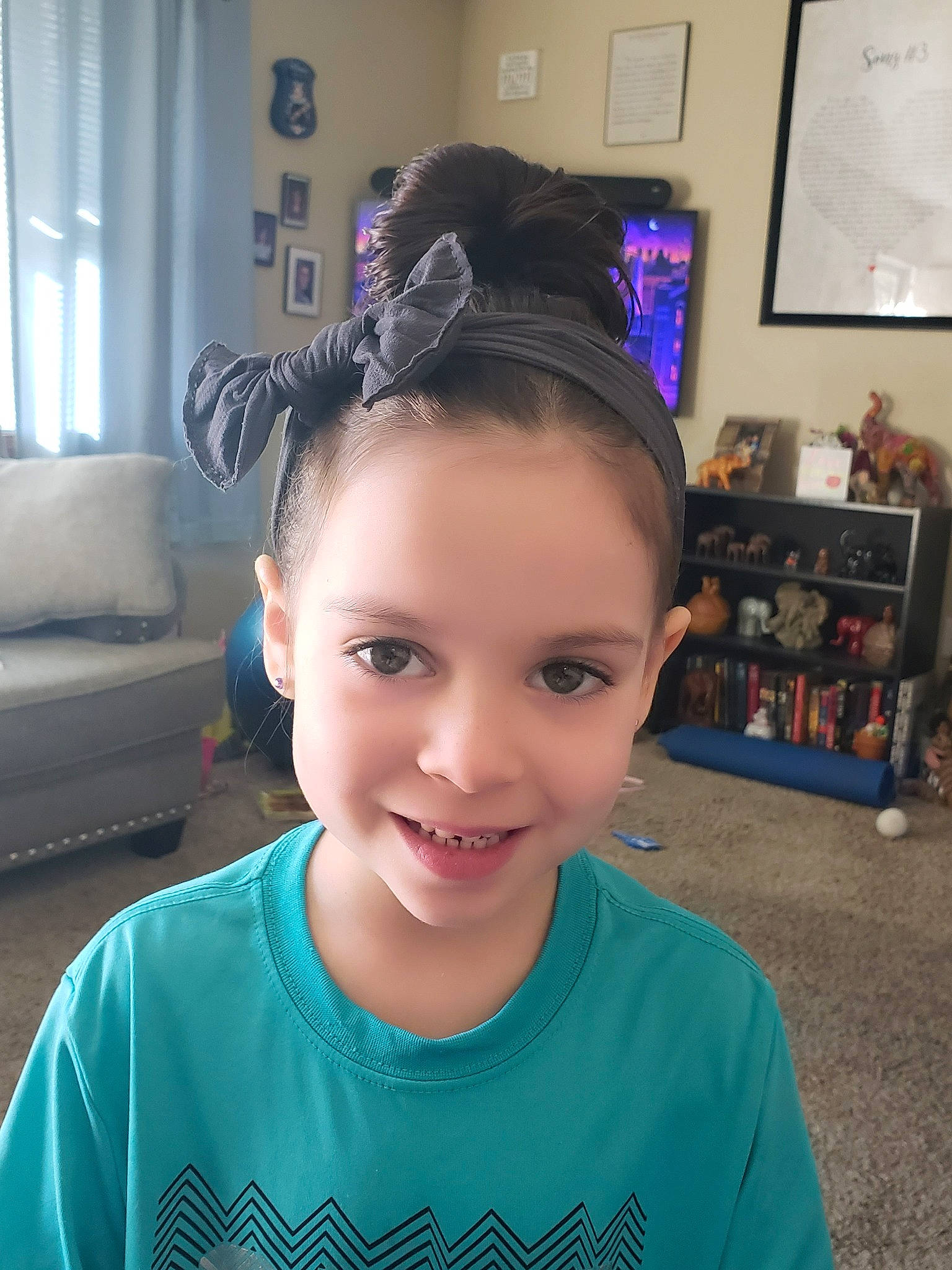 Marley is registered to the contest to win money with this photo: black_hair, blue, child, chonmage, ear, eyebrow, face, fashion_accessory, forehead, hair, hair_accessory, hair_coloring, hairstyle, head, joy, long_hair, person, photography, purple, smile