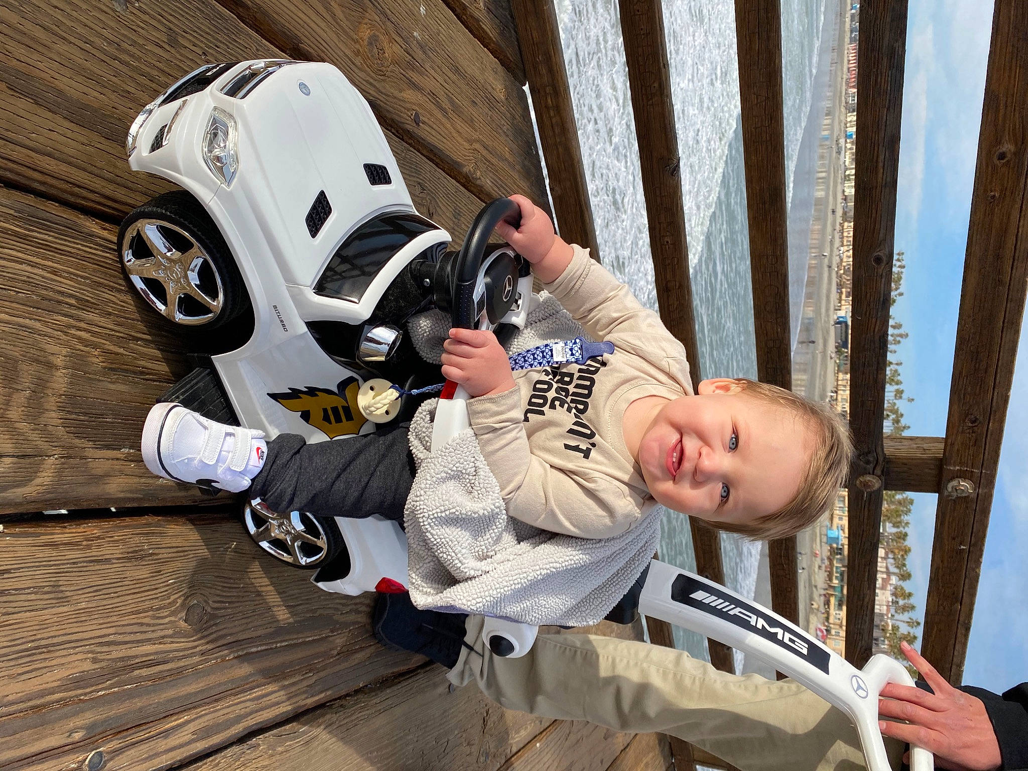 Rayden joined the competition — help win amazing prizes! automotive_design, automotive_lighting, boot, carmine, flooring, fun, happy, helmet, joy, leisure, machine, person, personal_protective_equipment, rolling, sitting, smile, sneakers, sports_gear, street_fashion, toddler