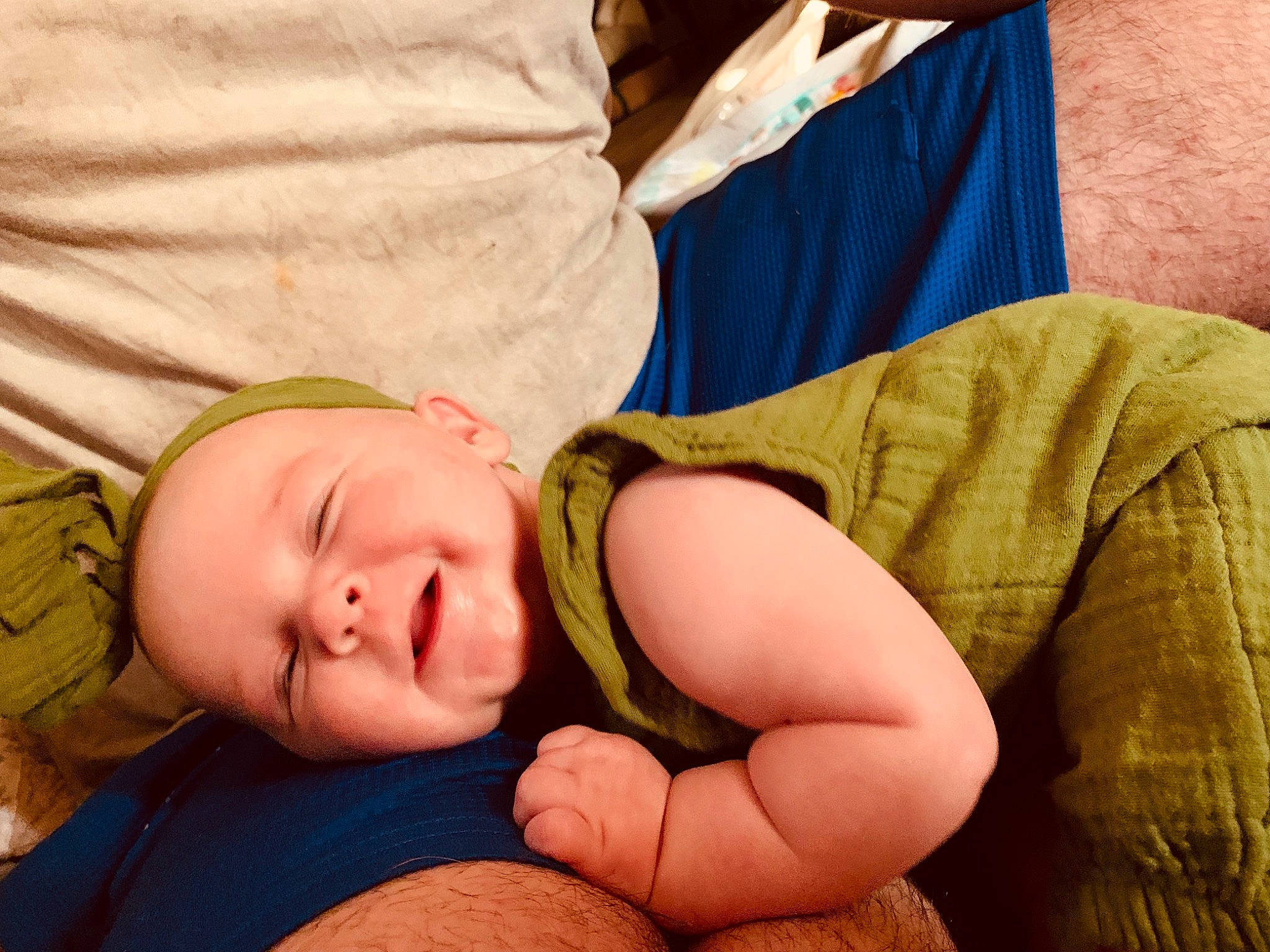 Rylann is registered to the contest to win money with this photo: abdomen, chest, comfort, couch, elbow, finger, gesture, glasses, grass, happy, human_body, leg, mouth, neck, person, skin, smile, t_shirt, toddler, trunk