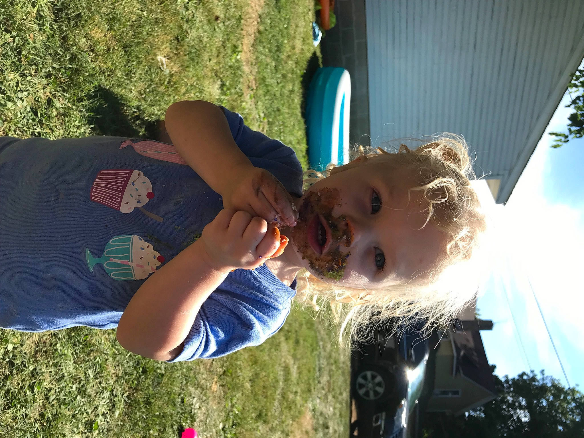 Peatyn is registered to the contest to win money with this photo: child, electric_blue, eyewear, fun, gesture, grass, grassland, happy, hat, leisure, mammal, people_in_nature, person, plant, recreation, sky, t_shirt, toddler, tree, water