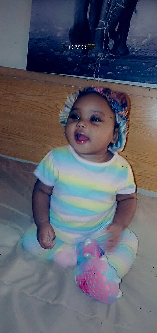Aamiyah is registered to the contest to win money with this photo: baby_toddler_clothing, blue, cheek, chin, cool, eye, eyelash, face, fun, happy, head, iris, mouth, nose, person, pink, purple, skin, sleeve, smile