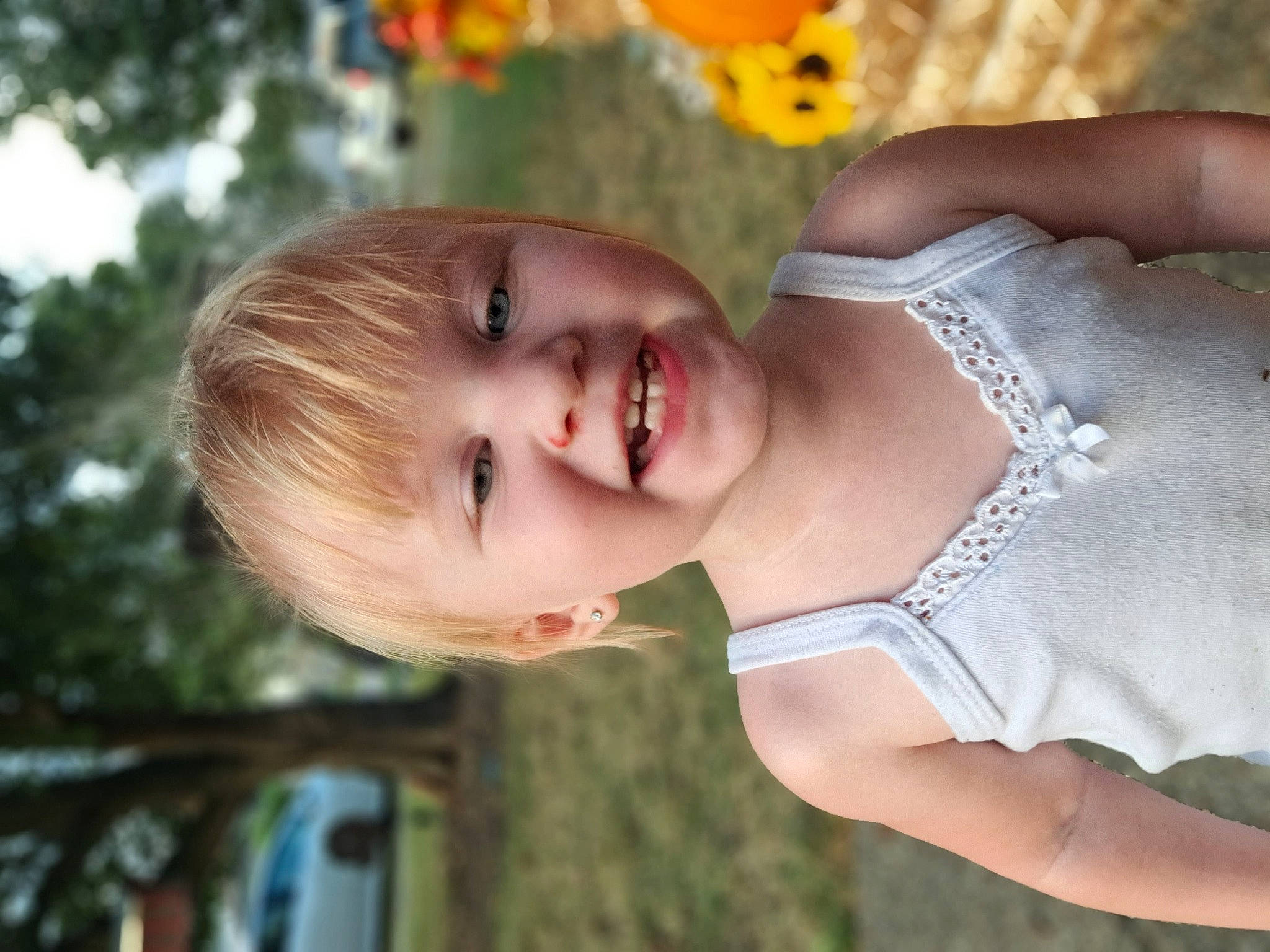 Everly joined the competition — help win amazing prizes! baby_toddler_clothing, child, dress, eye, flash_photography, flower, fun, grass, hairstyle, happy, hat, joy, lip, people_in_nature, person, plant, skin, smile, sunlight, toddler