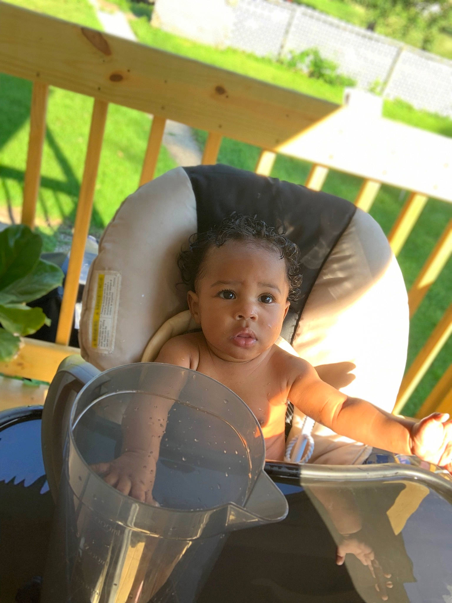 Azariah is registered to the contest to win money with this photo: aerospace_engineering, auto_part, automotive_wheel_system, baby, black_hair, chair, child, fun, grass, happy, leisure, machine, person, plant, recreation, shade, sitting, t_shirt, toddler, vacation