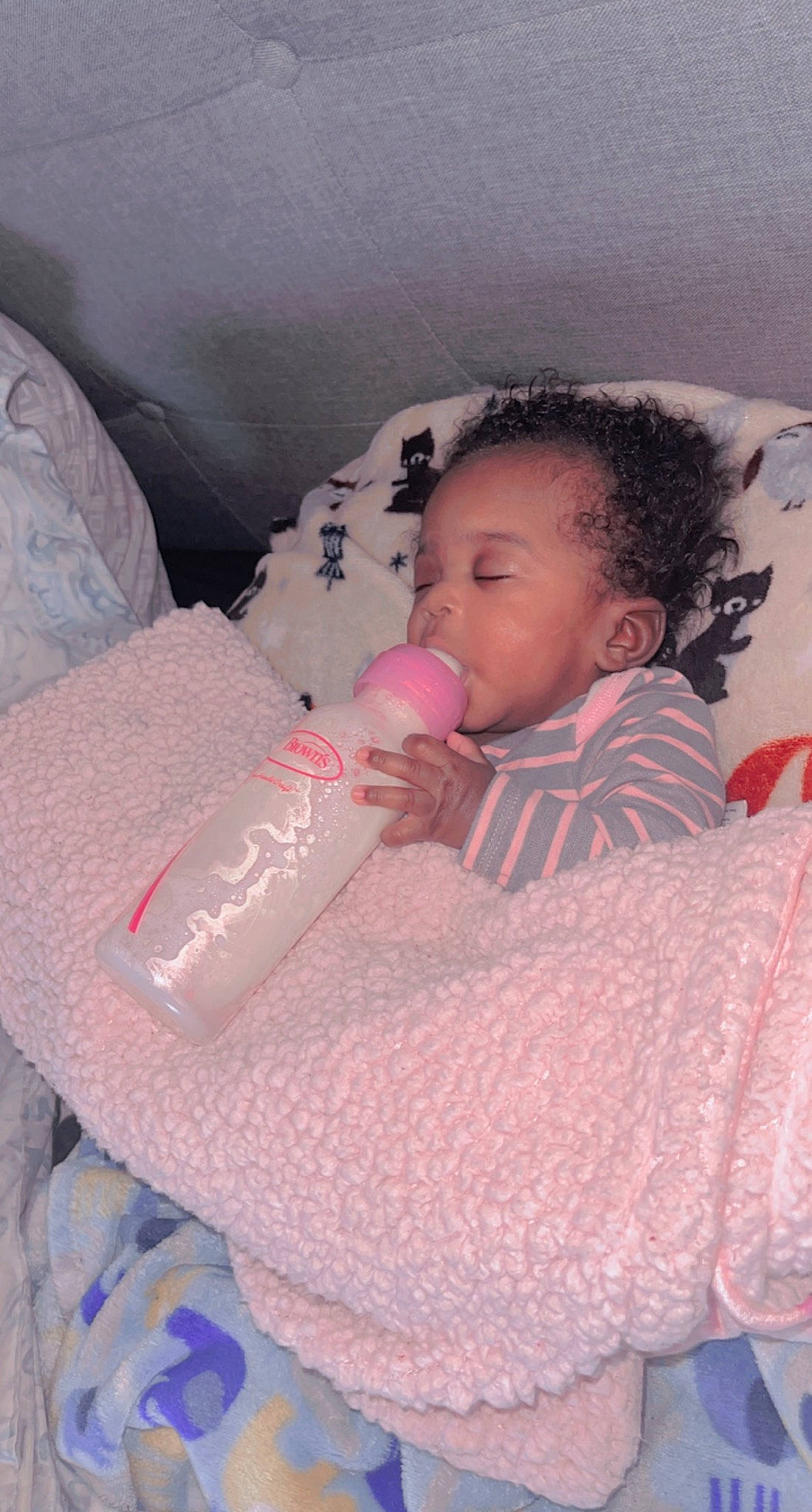 Avianna is registered to the contest to win money with this photo: baby, baby_products, baby_sleeping, baby_toddler_clothing, bedtime, bottle, cheek, child, comfort, drinkware, eye, face, linens, lip, mouth, nose, person, pink, skin, textile