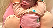 Sophia Grace joined the competition — help win amazing prizes! newborn, baby, sleeping, swaddle, pink, peach, cushion, infant, soft, cozy, bed, fabric, head, face, indoors, child, cute, peaceful, resting, wrapped