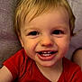 Esteban a rejoint le concours — aidez-le/la à gagner de superbes lots ! baby, blond_hair, candid, child, closeup, cute, expression, face, happy, indoors, innocent, joy, person, portrait, red_shirt, sitting, smile, teeth, toddler, young