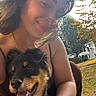 animal, building, canine, casual, dog, face, grass, happy, leisure, nature, outdoor, person, pet, portrait, puppy, smiling, summer, sunlight, trees, woman