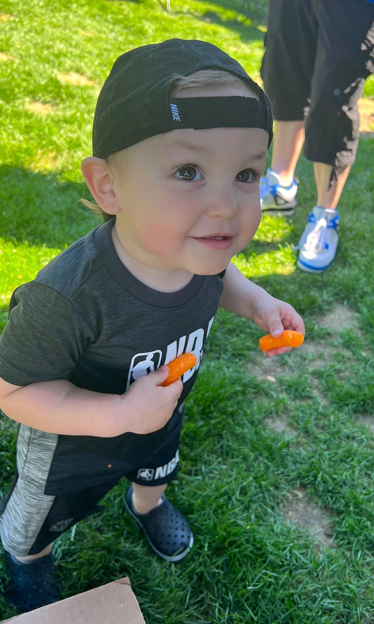 Hunter joined the competition — help win amazing prizes! baseball_cap, cap, eye, fun, grass, grass_family, happy, headwear, joy, leg, leisure, people, people_in_nature, person, photograph, shoe, shorts, smile, sneakers, summer