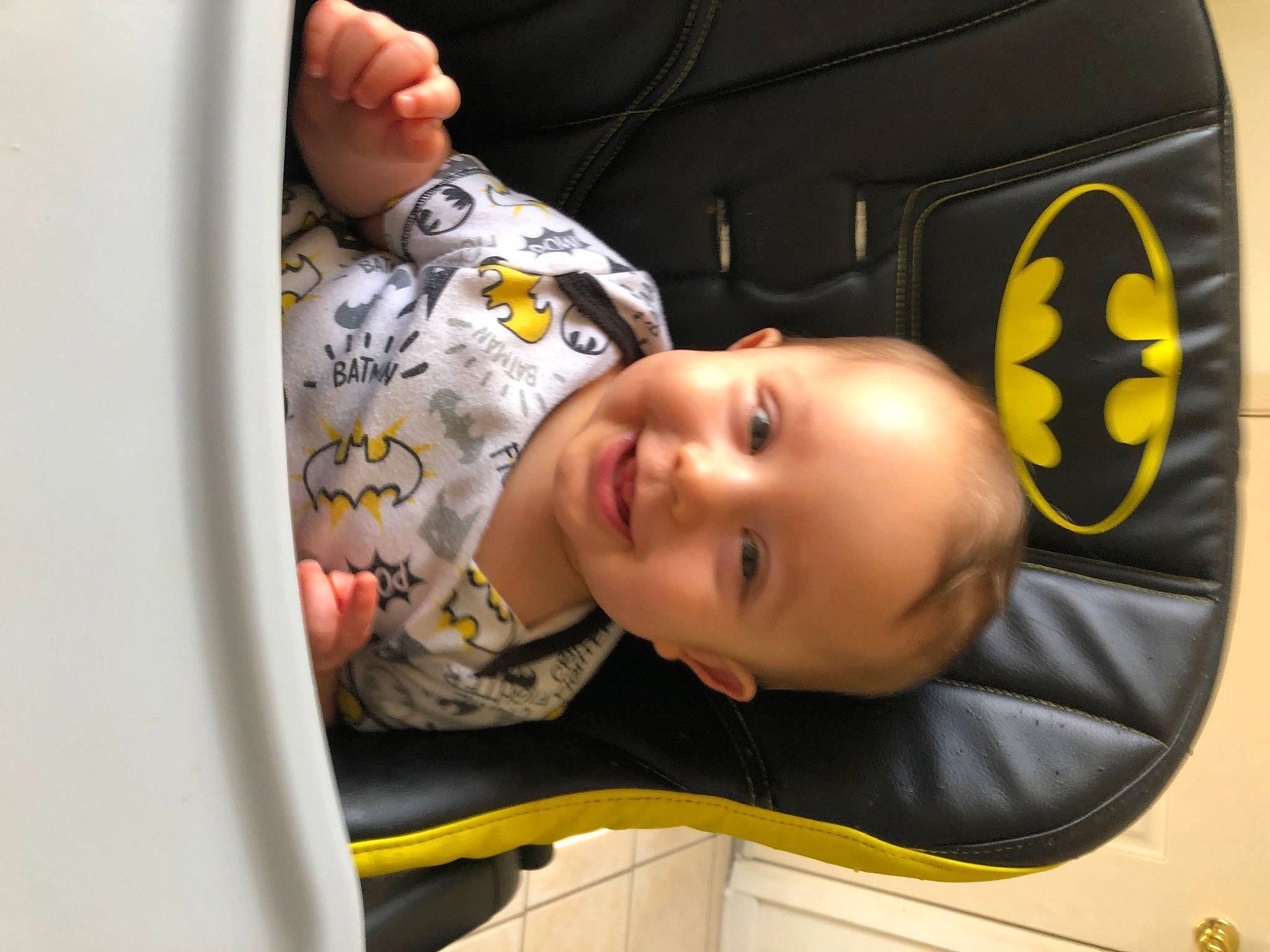 Kyle is registered to the contest to win money with this photo: baby, baby_products, baby_safety, baby_toddler_clothing, cheek, child, comfort, facial_expression, fun, happy, joy, nose, person, room, sleeve, smile, toddler