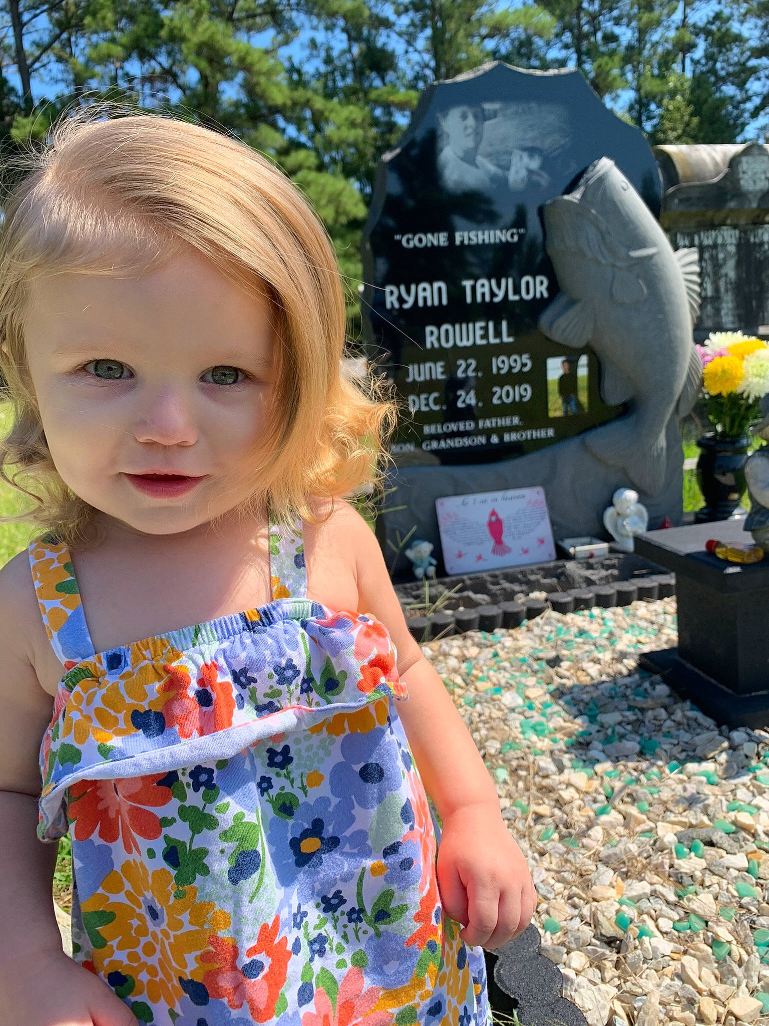 Bella joined the competition — help win amazing prizes! baby_toddler_clothing, child, clothing, dress, electric_blue, grass, grave, happy, headstone, leaf, leisure, person, photograph, plant, public_space, recreation, sleeve, statue, t_shirt, toddler