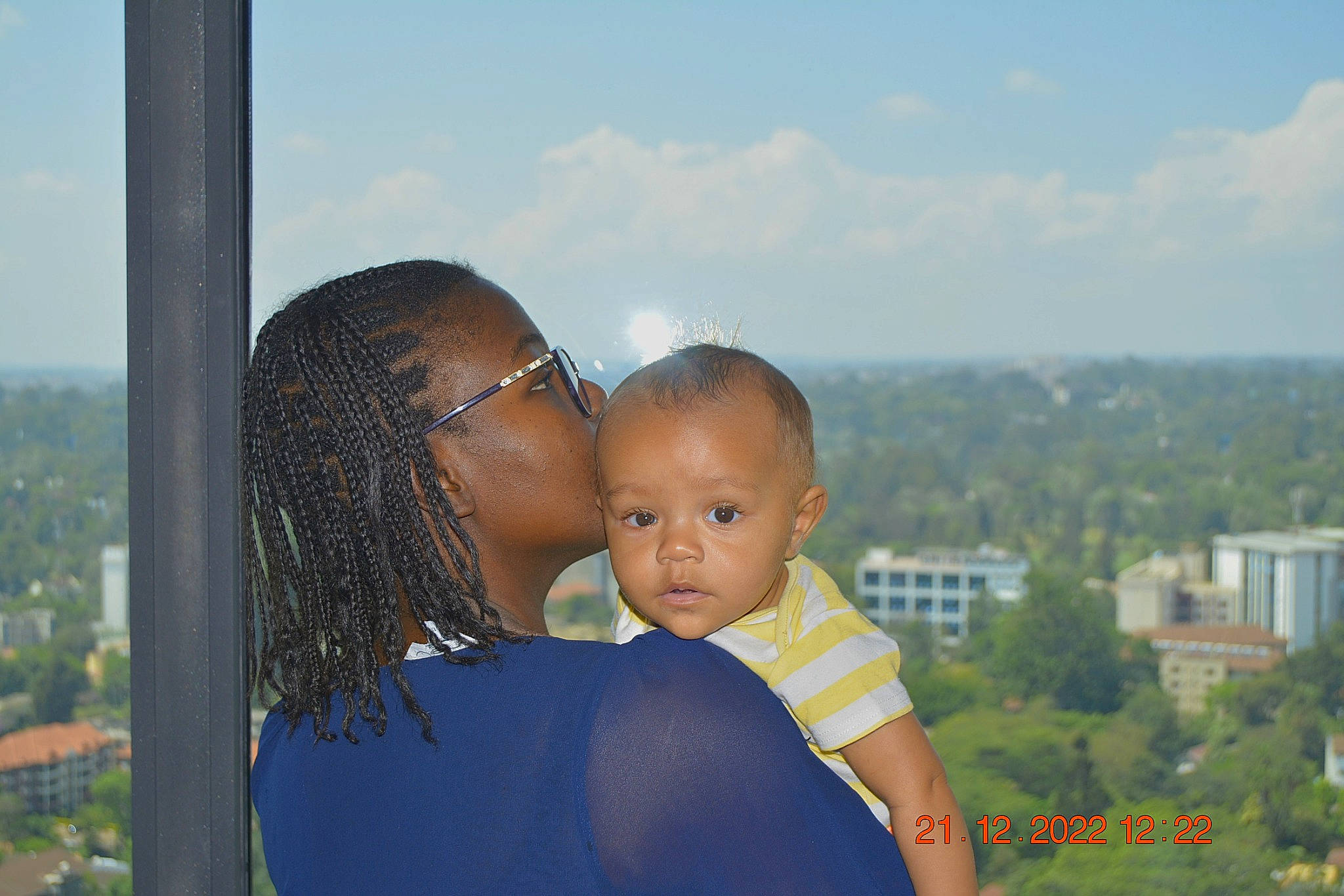 Dean is registered to the contest to win money with this photo: baby, child, cloud, face, flash_photography, fun, grass, happy, kiss, leisure, people_in_nature, person, portrait_photography, recreation, sky, spring, summer, toddler, travel, tree