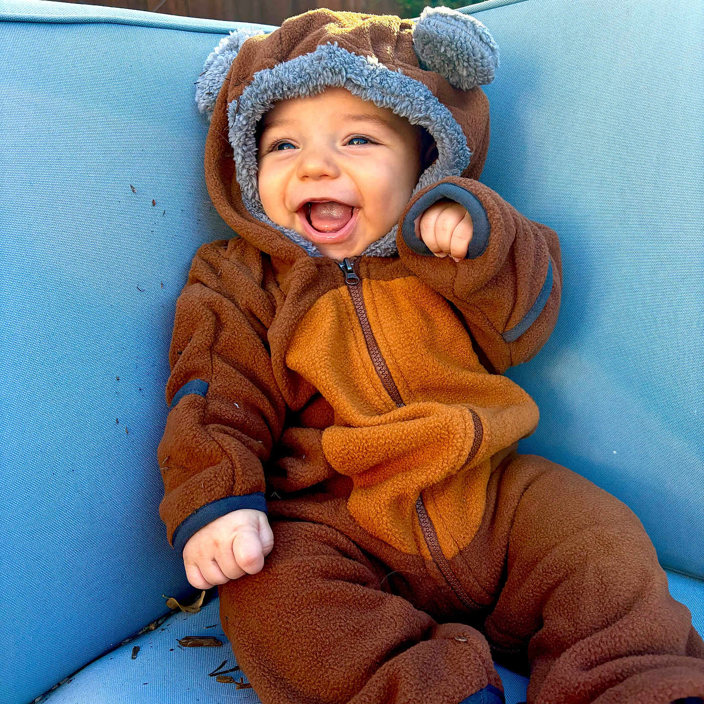 Arthur Kai is registered to the contest to win money with this photo: baby, babylaughing, bonnet, cap, clothing, coat, face, happy, hat, head, hood, hoodie, jacket, knitwear, laughing, person, photography, portrait, sweater, sweatshirt