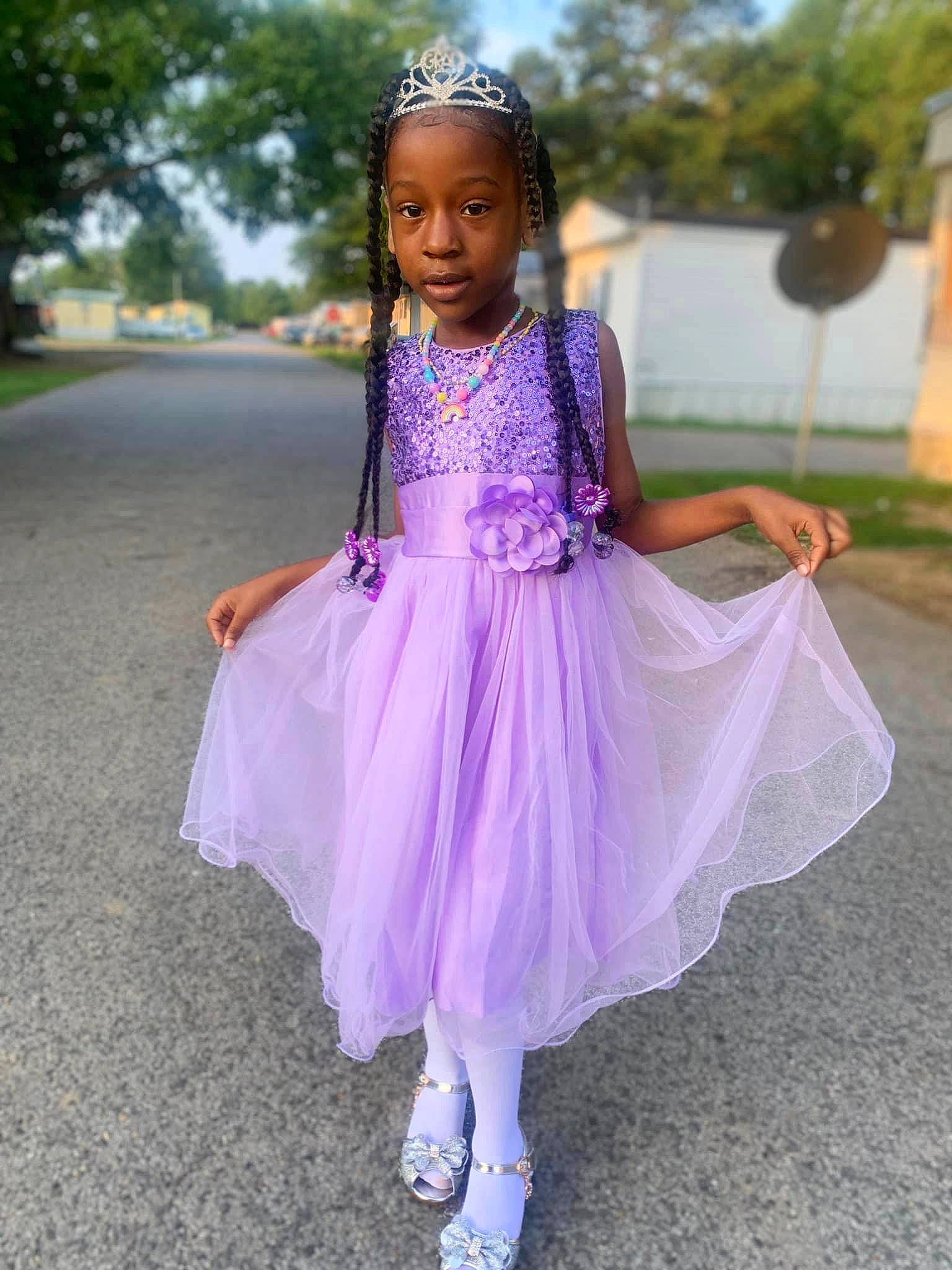 Iyanna is registered to the contest to win money with this photo: child, day_dress, dress, electric_blue, event, eye, face, fashion_accessory, fashion_design, fun, grass, happy, magenta, person, pink, plant, purple, sandal, sky, toddler