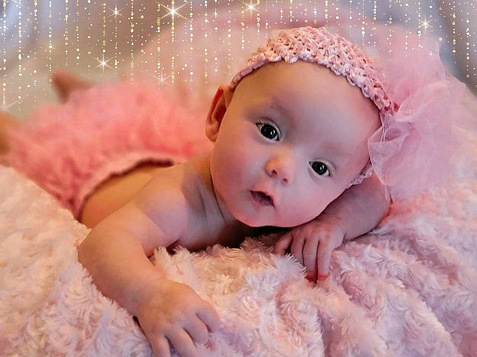 Emily is registered to the contest to win money with this photo: baby, baby_toddler_clothing, cap, cheek, child, eye, face, flash_photography, fun, hair_accessory, happy, headband, headgear, headpiece, iris, lip, person, pink, skin, surprise
