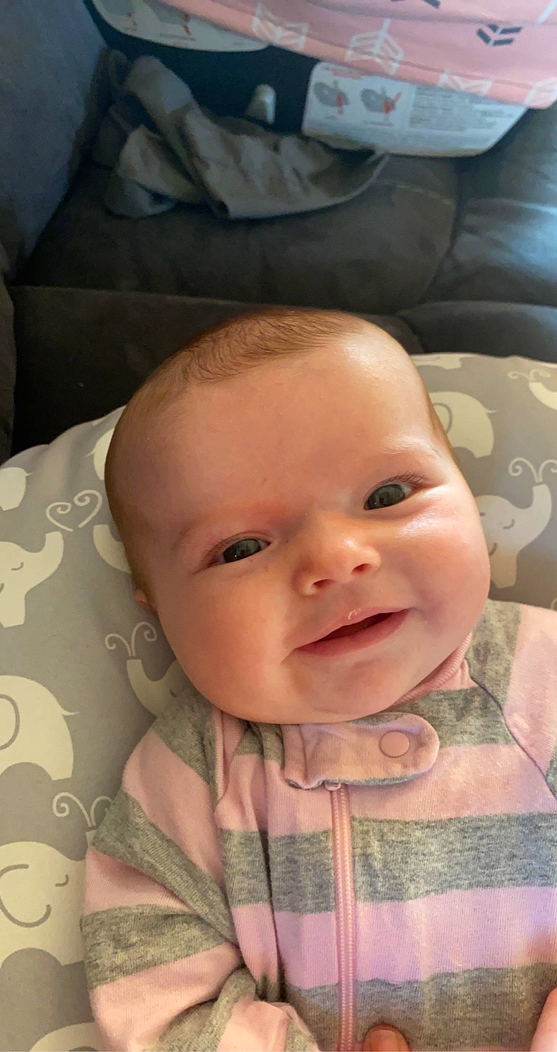 Harper is registered to the contest to win money with this photo: baby, baby_toddler_clothing, cheek, chin, comfort, eye, eyebrow, face, facial_expression, forehead, head, iris, joy, lip, mouth, nose, person, skin, sleeve, smile