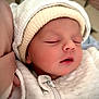 baby, newborn, infant, sleeping, hat, beanie, closeup, portrait, hospital, swaddle, zipper, cheeks, eyelashes, lips, peaceful, cozy, hand, fingers, blanket, soft_texture