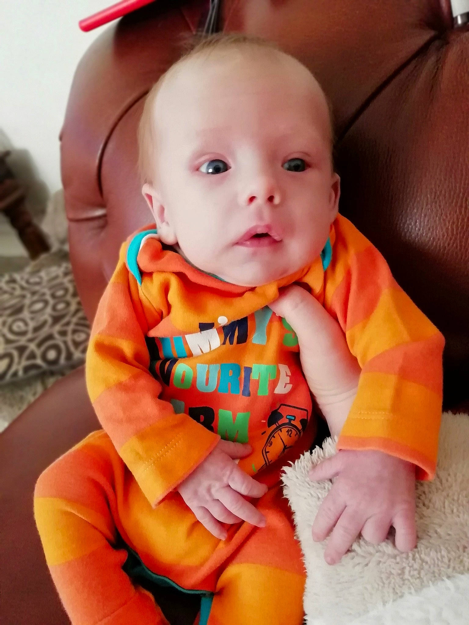 Malichi joined the competition — help win amazing prizes! baby, baby_toddler_clothing, child, orange, person, skin, toddler