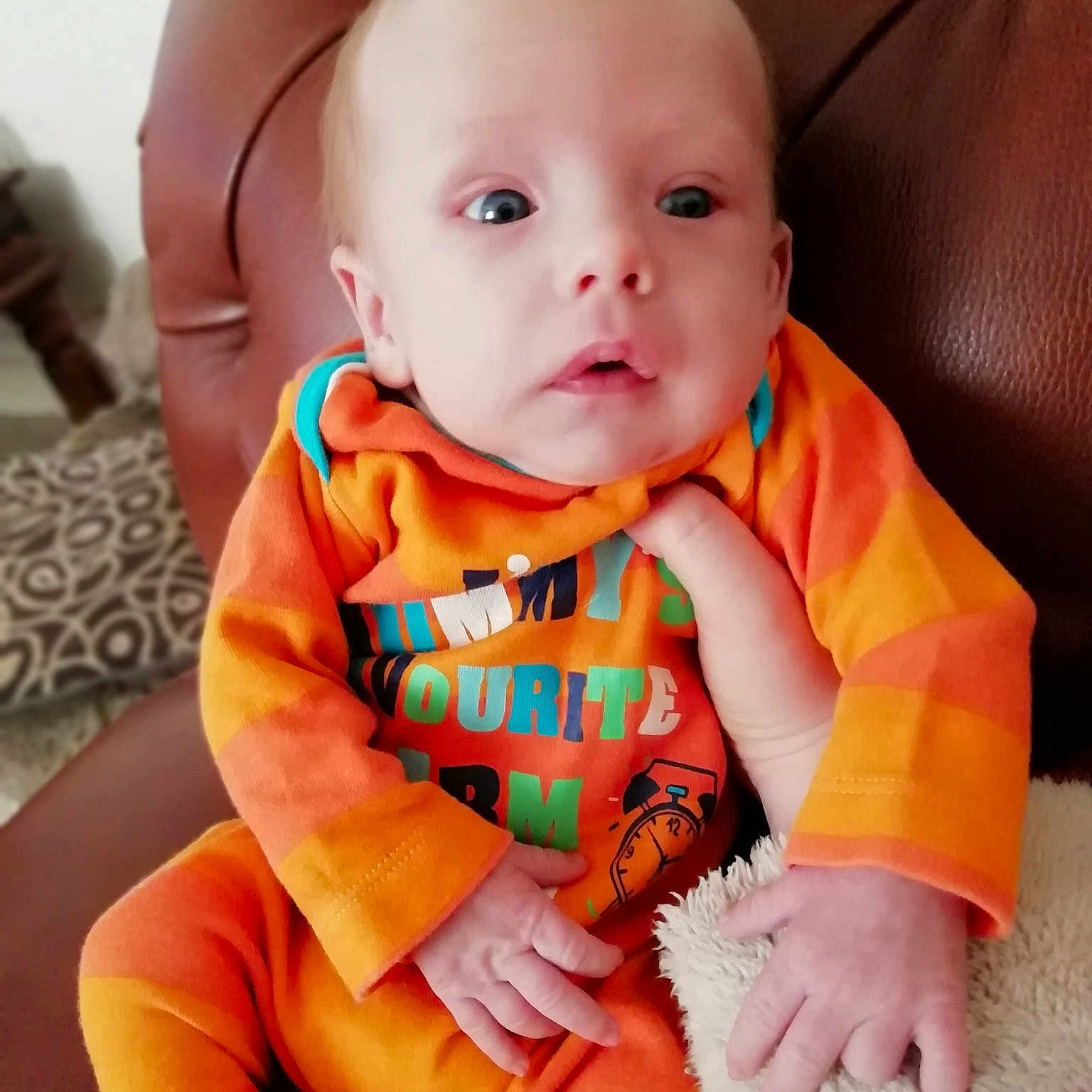 Malichi joined the competition — help win amazing prizes! baby, baby_toddler_clothing, child, orange, person, skin, toddler