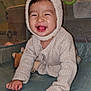 baby, child, smiling, crawling, hat, bear_ears, sweater, playpen, indoors, cute, happy, face, person, infant, childhood, cozy, warm_clothing, hands, tongue, joy