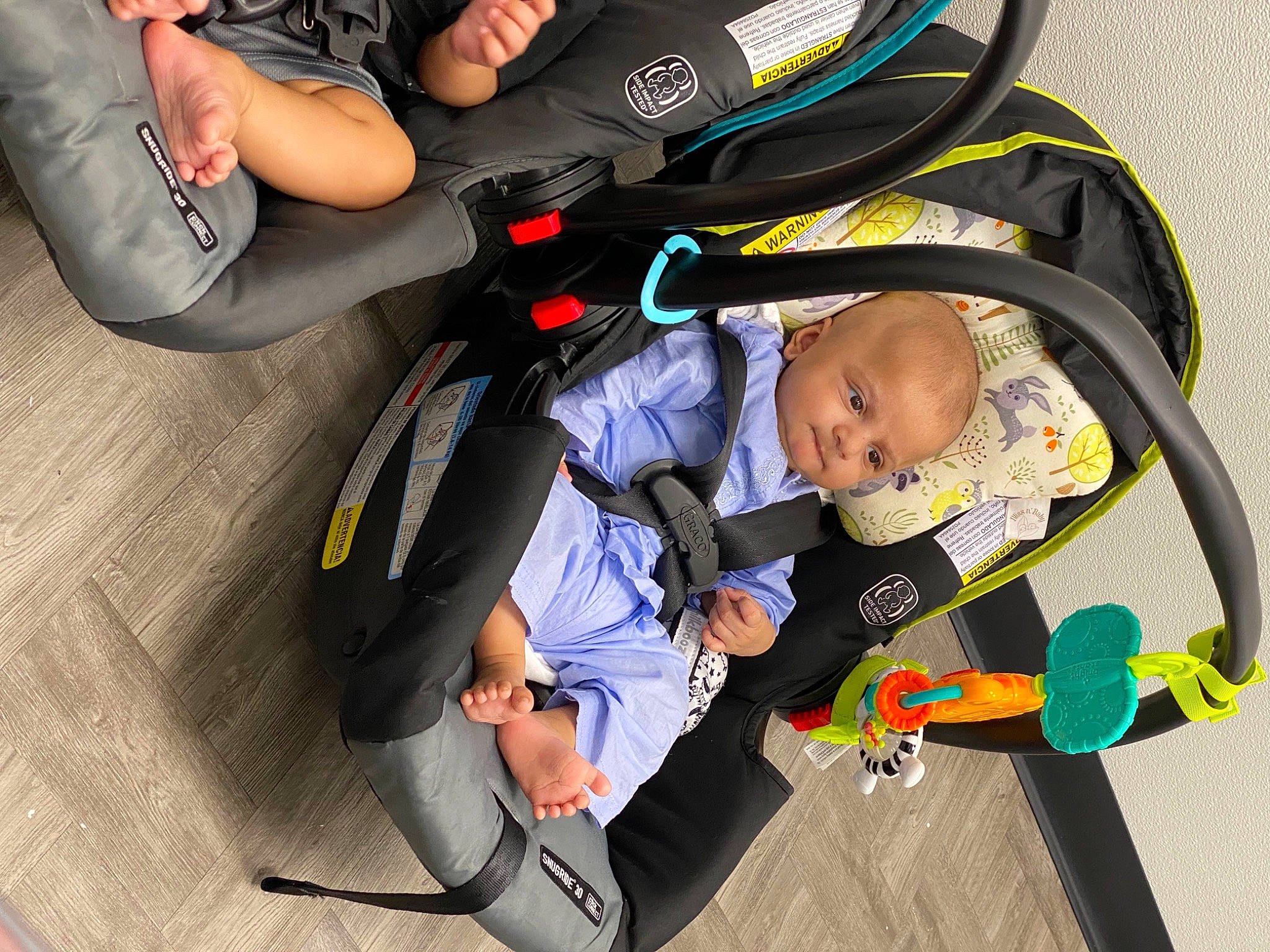 Ayaan joined the competition — help win amazing prizes! baby, baby_carriage, baby_products, baby_toddler_clothing, bag, car_seat, child, clothing, comfort, fun, knee, lap, luggage_and_bags, person, personal_protective_equipment, recreation, shoe, sitting, toddler, vehicle_door