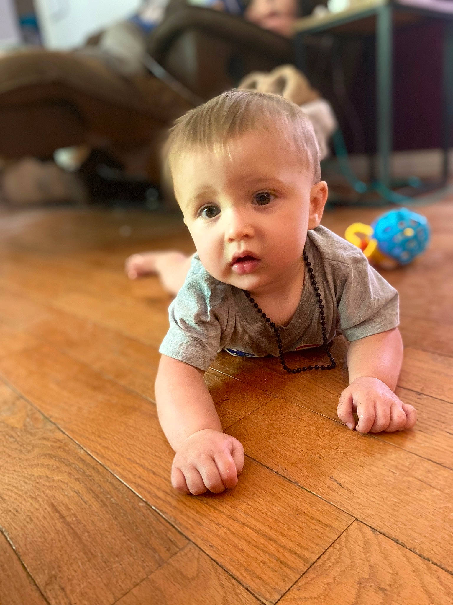 Brentlee joined the competition — help win amazing prizes! baby, baby_toddler_clothing, cheek, chin, eye, face, floor, flooring, happy, hardwood, head, iris, laminate_flooring, nose, person, skin, smile, toddler, varnish, wood