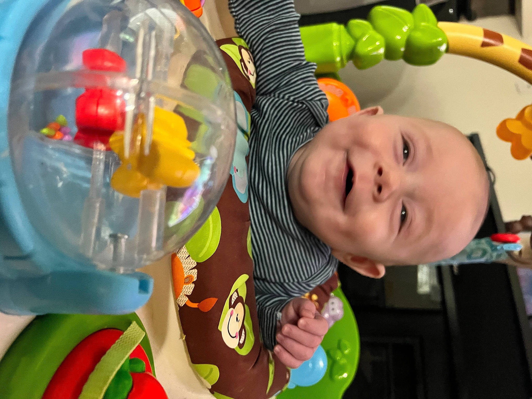 Kaisen is registered to the contest to win money with this photo: baby, baby_products, baby_toddler_clothing, baby_toys, cheek, child, circle, fun, happy, joy, leisure, orange, organ, person, plastic, plastic_bottle, play, room, smile, toddler