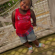 Londynn is registered to the contest to win money with this photo: architecture, building, child, clothing, face, female, footwear, girl, head, house, housing, pants, person, photography, porch, portrait, sandal, shoe, shorts, t_shirt