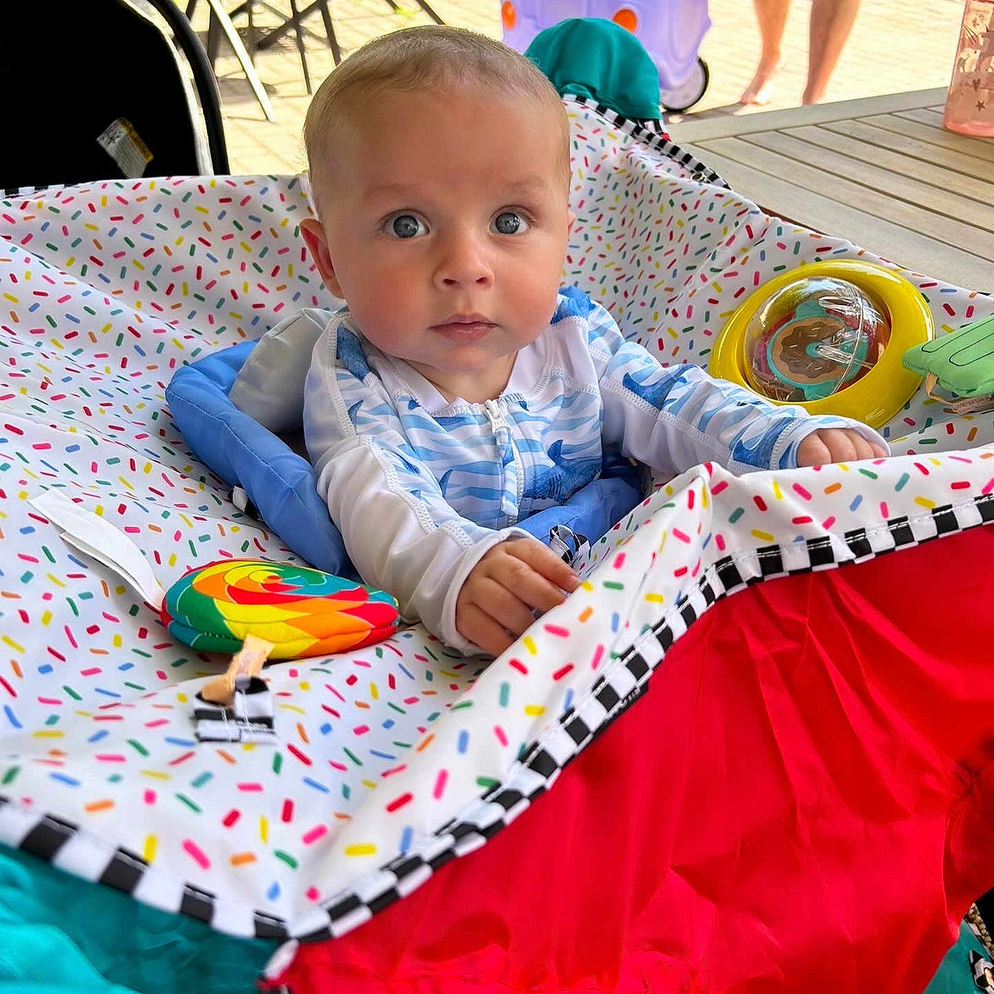 Michael is registered to the contest to win money with this photo: adult, architecture, baby, blanket, building, clothing, face, furniture, head, hockey, icehockey, male, man, outdoors, person, photography, portrait, quilt, shelter, shorts