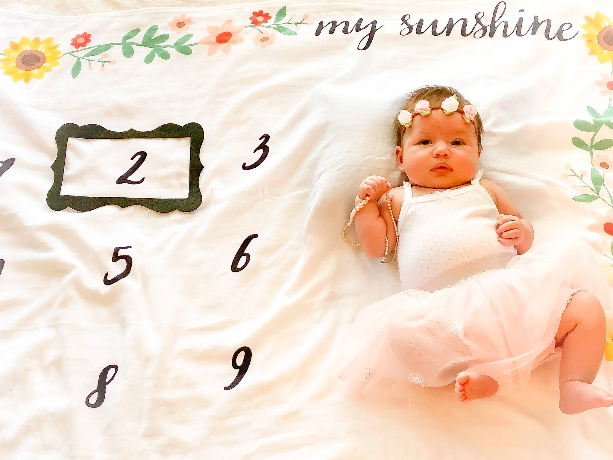 Sunny is registered to the contest to win money with this photo: baby, baby_sleeping, child, font, happy, headwear, person, room, toddler