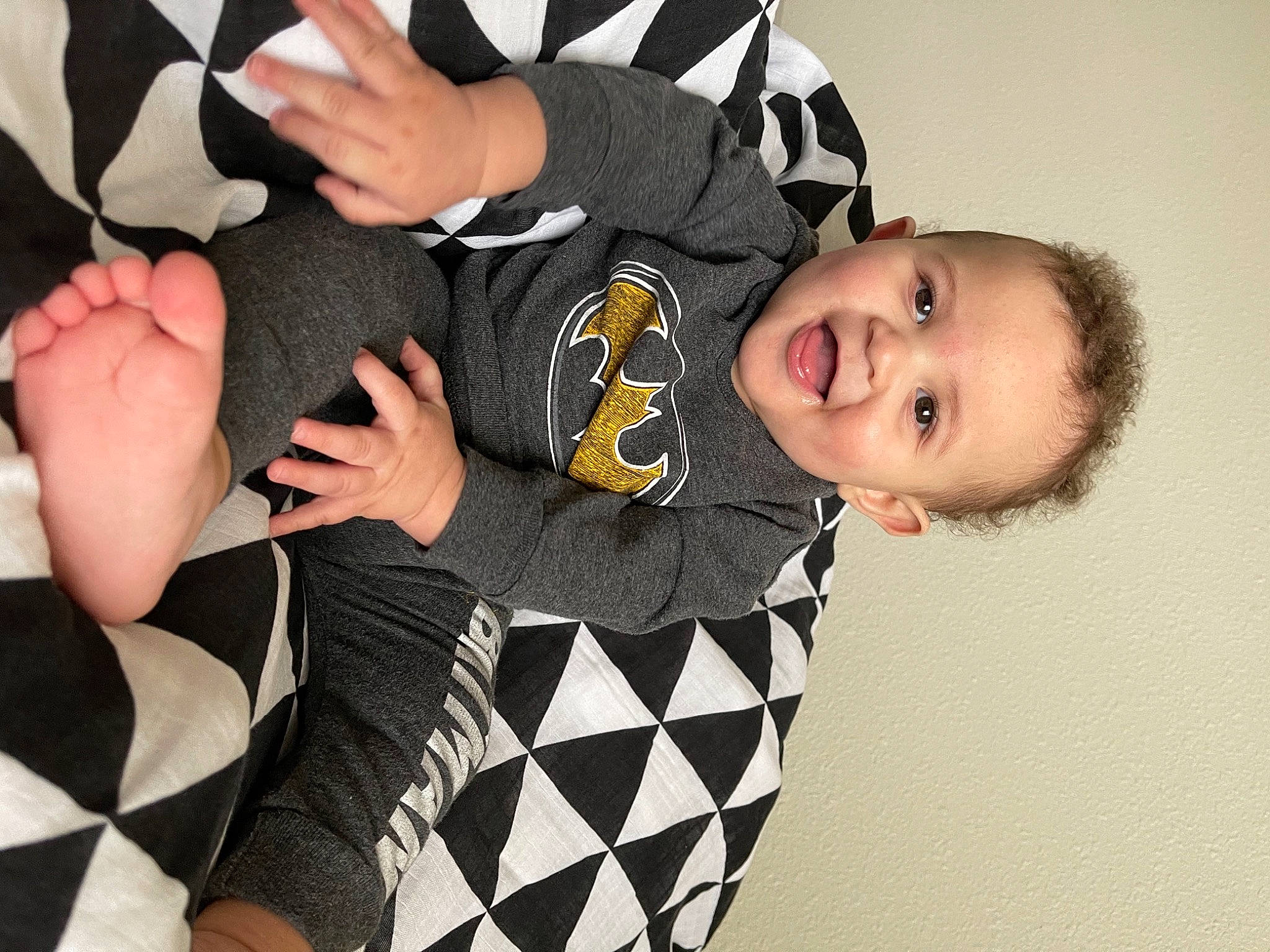 Everest is registered to the contest to win money with this photo: baby, baby_toddler_clothing, child, comfort, elbow, eye, finger, flash_photography, fun, gesture, hand, happy, mammal, pattern, person, sitting, sleeve, smile, thumb, toddler