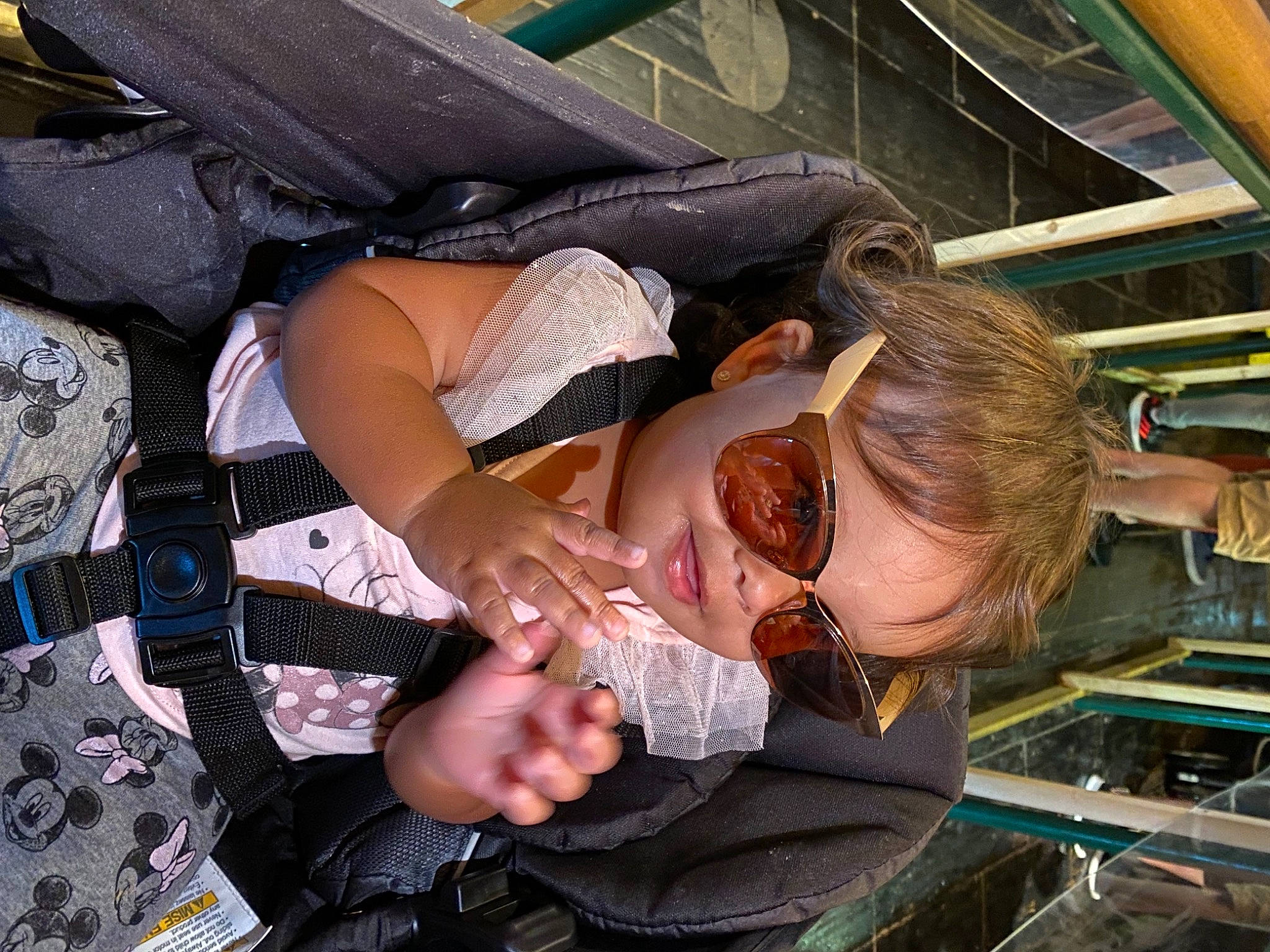 Avery is registered to the contest to win money with this photo: arm, baby, child, comfort, cool, elbow, eyewear, flesh, fun, gesture, happy, lap, leisure, mouth, person, sunglasses, thumb, toddler, travel, vacation