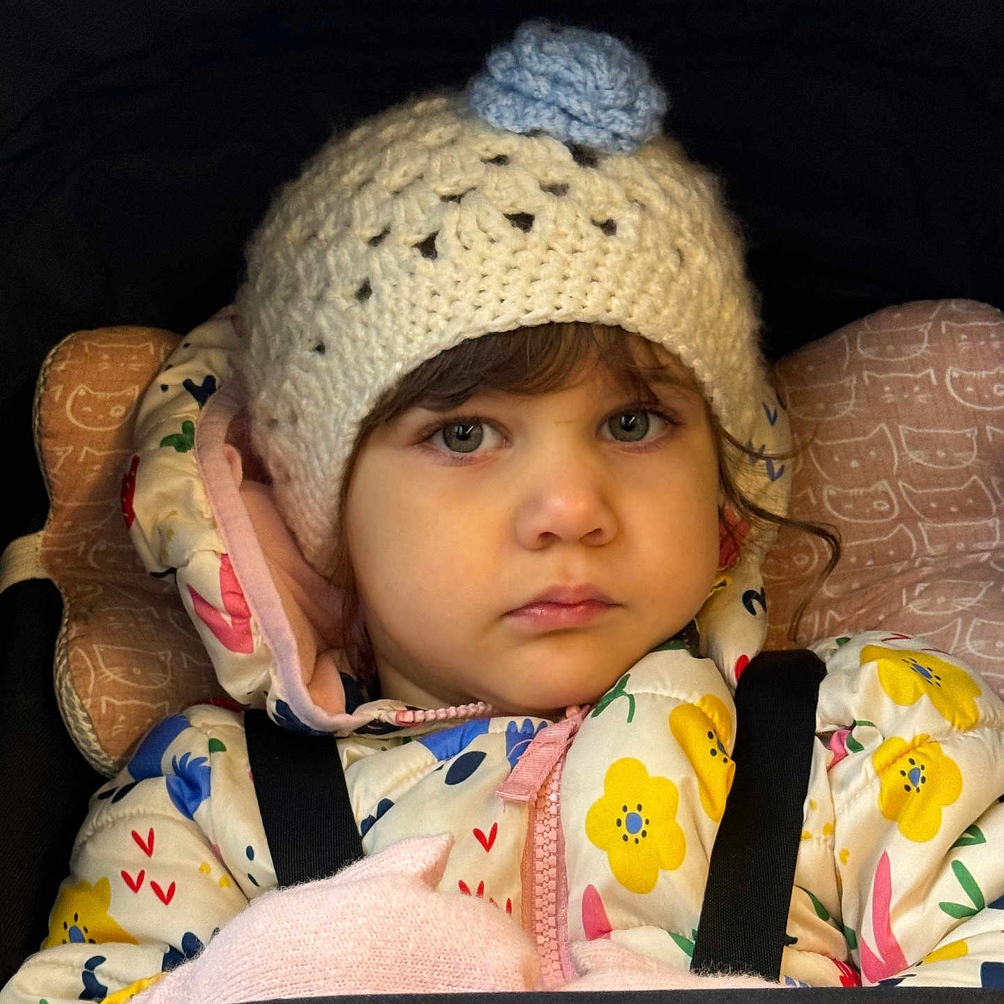 Lara joined the competition — help win amazing prizes! baby, beanie, bonnet, cap, car, car_interior, carseat, clothing, coat, cushion, face, hat, head, homedecor, jacket, person, photography, portrait, transportation, vehicle