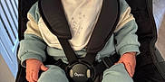 Daniel joined the competition — help win amazing prizes! baby, child, car_seat, hat, clothing, smile, face, hands, seat_belt, indoor, cozy, infant, cute, knit_hat, straps, footwear, socks, portrait, person, happy
