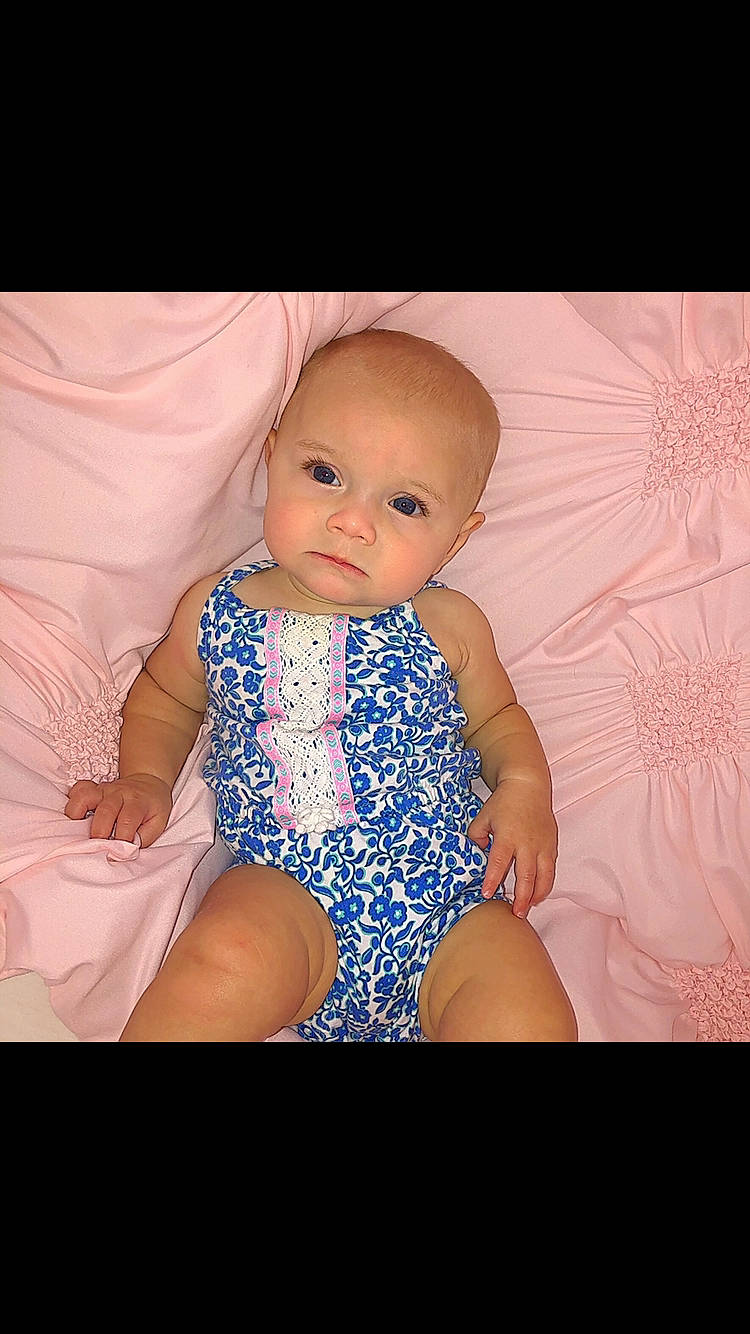 Abelle joined the competition — help win amazing prizes! arm, baby, baby_toddler_clothing, dress, eye, face, flash_photography, gesture, hand, happy, human_body, iris, leg, person, pink, purple, skin, stomach, thigh, thumb