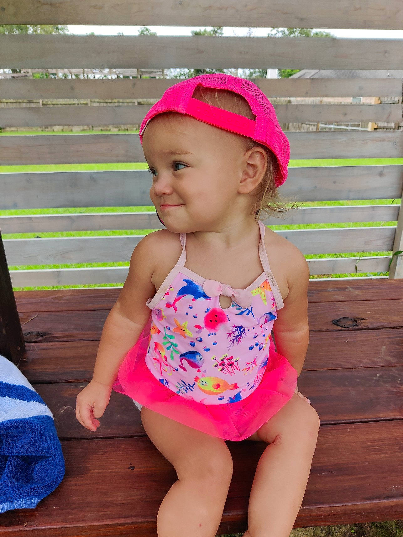 Abelle is registered to the contest to win money with this photo: baby_toddler_clothing, child, clothing, electric_blue, fun, goggles, happy, headwear, human_leg, joy, leisure, magenta, neck, one_piece_swimsuit, person, pink, recreation, smile, summer, thigh