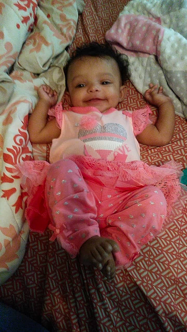 Hazel joined the competition — help win amazing prizes! bedtime, cheek, child, daughter, day, eye, fun, girl, head, infant, iris, person, pink, product, sitting, skin, smile, textile, toddler