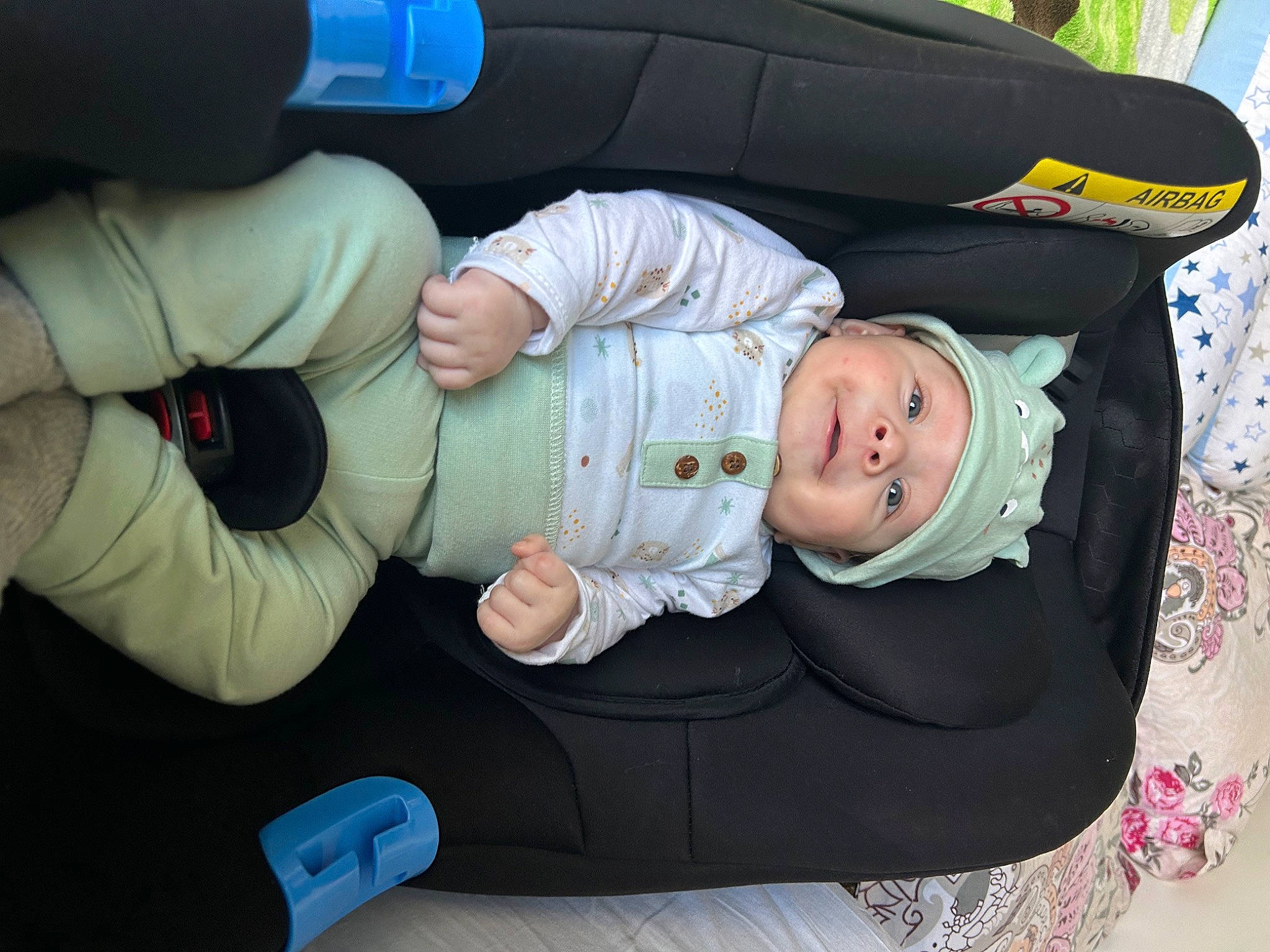 Ian Differ participe au concours pour gagner de l'argent avec cette photo : baby, baby_carriage, baby_products, baby_toddler_clothing, car_seat, child, comfort, elbow, gesture, grass, hat, headwear, lap, person, product, sitting, thumb, toddler, tree