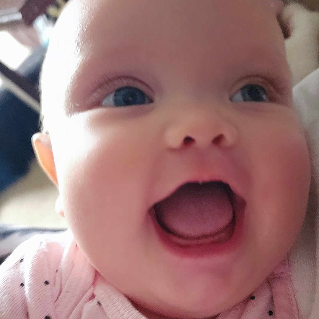 Arielle joined the competition — help win amazing prizes! baby, blue_eyes, cheeks, child, close_up, cute, expression, face, happy, head, indoor, infant, mouth_open, person, pink_clothing, polka_dots, portrait, skin, smile, young