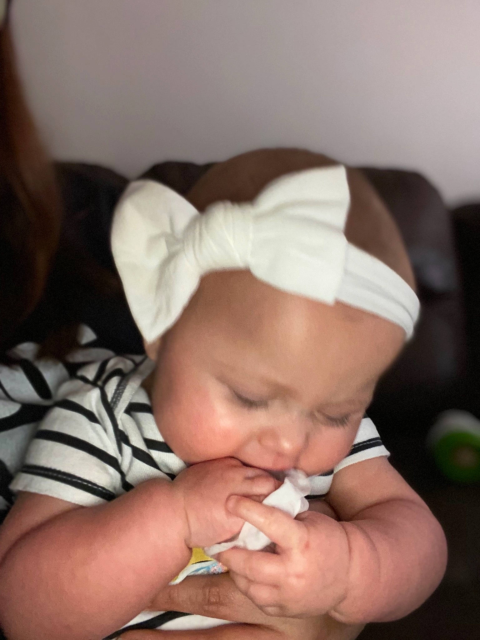 Hensley is registered to the contest to win money with this photo: baby, cheek, child, ear, finger, hand, headwear, lip, mouth, nail, nose, person, skin, thumb, toddler