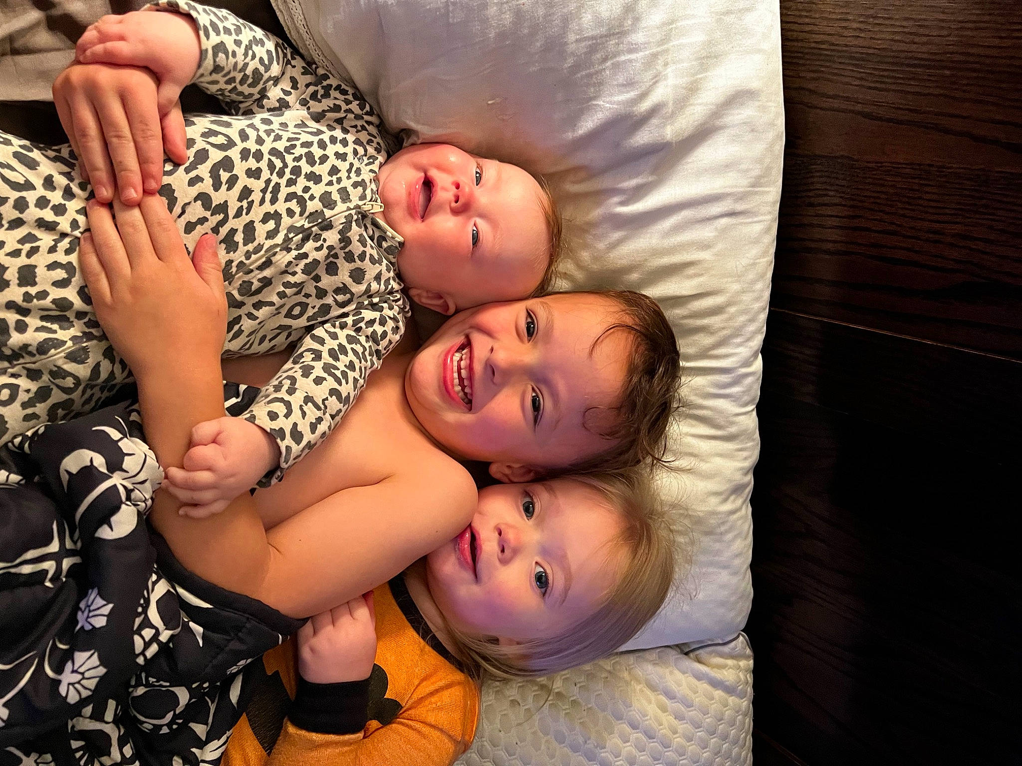 June is registered to the contest to win money with this photo: abdomen, arm, baby, child, comfort, couch, event, face, flash_photography, fun, glasses, hand, happy, hat, joy, person, room, skin, smile, toddler