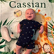 Cassian joined the competition — help win amazing prizes! baby, infant, smiling, blanket, animal_print, elephant, giraffe, lion, monkey, milestone_badge, 2_months, clothing, romper, cute, lying_down, portrait, child, colorful, happy, indoors